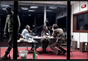 The RTLM Radio Station set in the play "Hate Radio "reenacting a typical broadcast